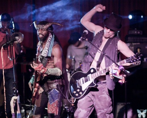 John Paul Miller on guitar with Al Al Ingram and Derrick Johnson in the background