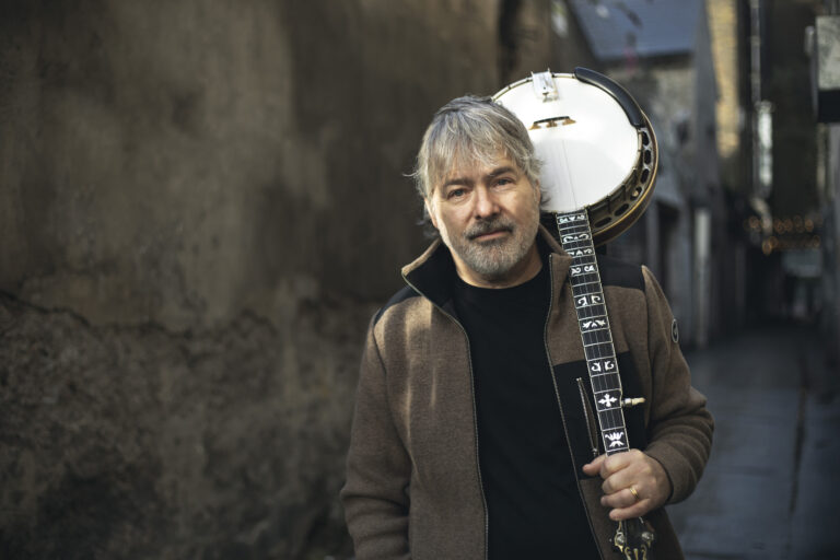 A photo of Béla Fleck with his banjo. Photo by Hazel Coonagh.
